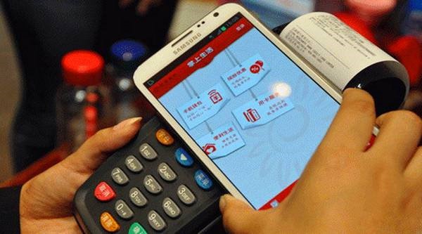 揭手机支付:用户多个记账本 商贩不用会"吃亏"